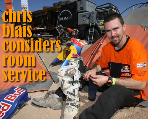 american team rider chris blais checks his sock inventory halfway into dakar